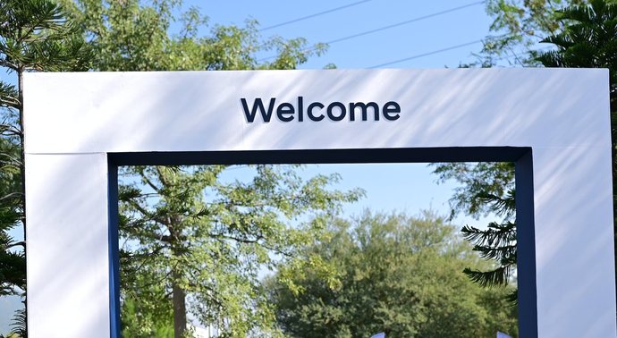 Welcome arch and flags