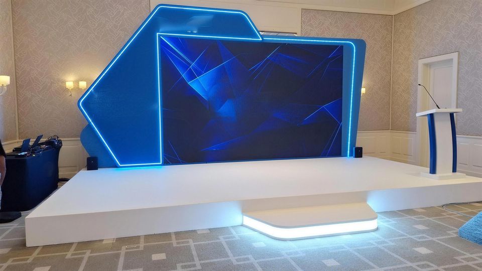 Stage with an LED wall and lit edges, before guests arrive