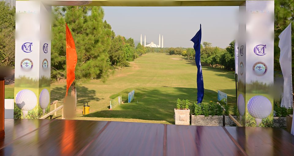 Tee arch and flags framing the fairway
